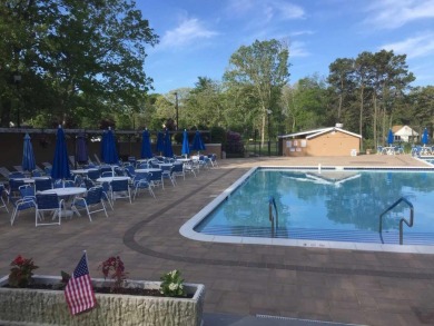 This lovely Baronet model is an end-unit with tasteful upgrades on Leisure Village Golf Course in New York - for sale on GolfHomes.com, golf home, golf lot