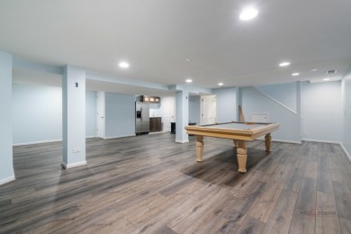 Welcome to this exceptional 5-bedroom, 4.1-bathroom residence on Hillcrest Country Club in Illinois - for sale on GolfHomes.com, golf home, golf lot