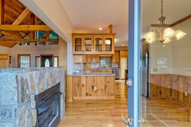 Breathtaking views abound from this 3-bedroom, 3.5-bath home on on Chatuge Shores Golf Course in North Carolina - for sale on GolfHomes.com, golf home, golf lot