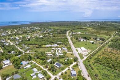 Island Charm Meets Modern Comfort - Welcome to 7256 Victory Road on Alden Pines Golf Club in Florida - for sale on GolfHomes.com, golf home, golf lot