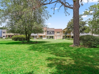 This spacious 2-bedroom, 2 1/2 -bathroom townhome is nestled in on On Top of the World Golf Course in Florida - for sale on GolfHomes.com, golf home, golf lot