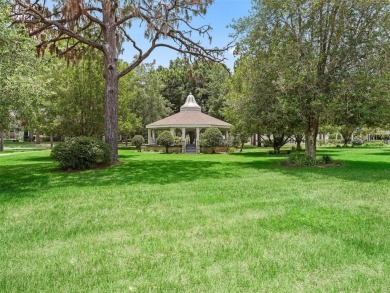 This spacious 2-bedroom, 2 1/2 -bathroom townhome is nestled in on On Top of the World Golf Course in Florida - for sale on GolfHomes.com, golf home, golf lot
