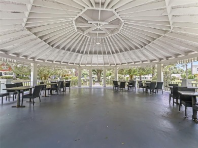 This spacious 2-bedroom, 2 1/2 -bathroom townhome is nestled in on On Top of the World Golf Course in Florida - for sale on GolfHomes.com, golf home, golf lot