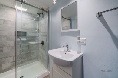 Welcome to this exceptional 5-bedroom, 4.1-bathroom residence on Hillcrest Country Club in Illinois - for sale on GolfHomes.com, golf home, golf lot