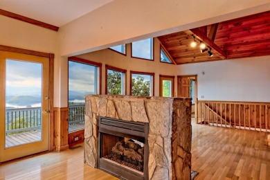 Breathtaking views abound from this 3-bedroom, 3.5-bath home on on Chatuge Shores Golf Course in North Carolina - for sale on GolfHomes.com, golf home, golf lot