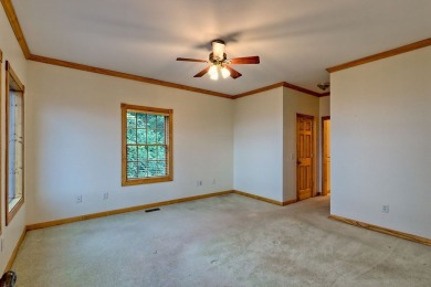 Breathtaking views abound from this 3-bedroom, 3.5-bath home on on Chatuge Shores Golf Course in North Carolina - for sale on GolfHomes.com, golf home, golf lot