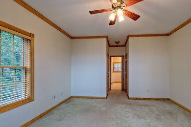 Breathtaking views abound from this 3-bedroom, 3.5-bath home on on Chatuge Shores Golf Course in North Carolina - for sale on GolfHomes.com, golf home, golf lot