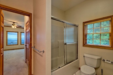 Breathtaking views abound from this 3-bedroom, 3.5-bath home on on Chatuge Shores Golf Course in North Carolina - for sale on GolfHomes.com, golf home, golf lot
