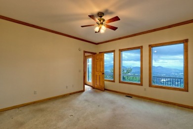 Breathtaking views abound from this 3-bedroom, 3.5-bath home on on Chatuge Shores Golf Course in North Carolina - for sale on GolfHomes.com, golf home, golf lot