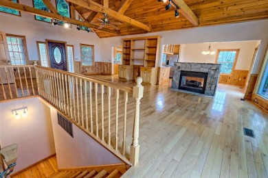 Breathtaking views abound from this 3-bedroom, 3.5-bath home on on Chatuge Shores Golf Course in North Carolina - for sale on GolfHomes.com, golf home, golf lot