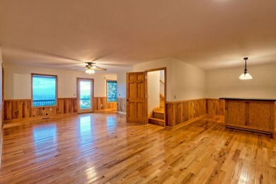 Breathtaking views abound from this 3-bedroom, 3.5-bath home on on Chatuge Shores Golf Course in North Carolina - for sale on GolfHomes.com, golf home, golf lot