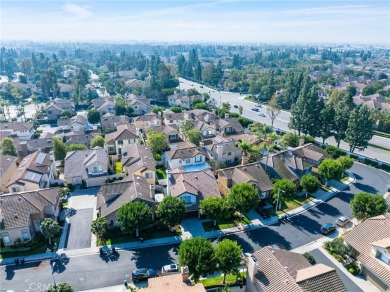 Nestled in the charming tree-lined golf-course community of on Tustin Ranch Golf Club in California - for sale on GolfHomes.com, golf home, golf lot