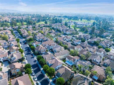 Nestled in the charming tree-lined golf-course community of on Tustin Ranch Golf Club in California - for sale on GolfHomes.com, golf home, golf lot