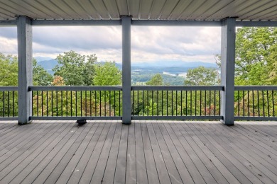 Breathtaking views abound from this 3-bedroom, 3.5-bath home on on Chatuge Shores Golf Course in North Carolina - for sale on GolfHomes.com, golf home, golf lot