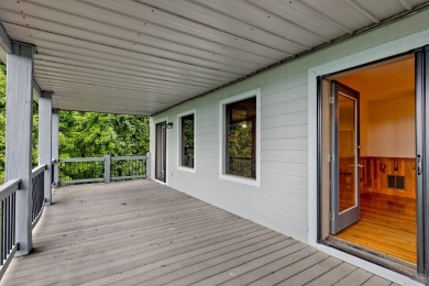 Breathtaking views abound from this 3-bedroom, 3.5-bath home on on Chatuge Shores Golf Course in North Carolina - for sale on GolfHomes.com, golf home, golf lot