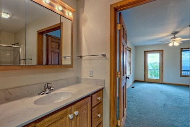 Breathtaking views abound from this 3-bedroom, 3.5-bath home on on Chatuge Shores Golf Course in North Carolina - for sale on GolfHomes.com, golf home, golf lot