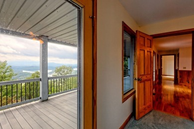 Breathtaking views abound from this 3-bedroom, 3.5-bath home on on Chatuge Shores Golf Course in North Carolina - for sale on GolfHomes.com, golf home, golf lot