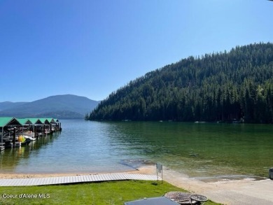 Seller financing available at 6%. Lakefront condo with a boat on Priest Lake Golf and Tennis Club in Idaho - for sale on GolfHomes.com, golf home, golf lot