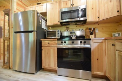 Welcome to your serene Northwoods escape in the heart of Voyager on Voyager Village Country Club - Voyager in Wisconsin - for sale on GolfHomes.com, golf home, golf lot