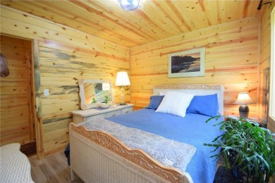 Welcome to your serene Northwoods escape in the heart of Voyager on Voyager Village Country Club - Voyager in Wisconsin - for sale on GolfHomes.com, golf home, golf lot