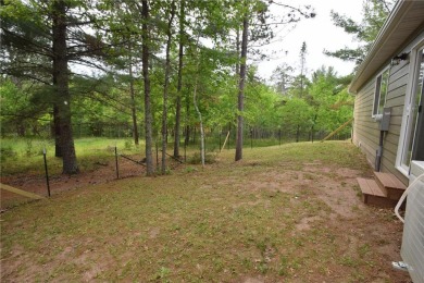 Welcome to your serene Northwoods escape in the heart of Voyager on Voyager Village Country Club - Voyager in Wisconsin - for sale on GolfHomes.com, golf home, golf lot