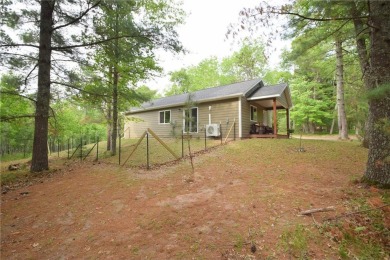 Welcome to your serene Northwoods escape in the heart of Voyager on Voyager Village Country Club - Voyager in Wisconsin - for sale on GolfHomes.com, golf home, golf lot