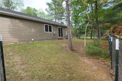 Welcome to your serene Northwoods escape in the heart of Voyager on Voyager Village Country Club - Voyager in Wisconsin - for sale on GolfHomes.com, golf home, golf lot