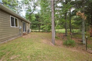 Welcome to your serene Northwoods escape in the heart of Voyager on Voyager Village Country Club - Voyager in Wisconsin - for sale on GolfHomes.com, golf home, golf lot