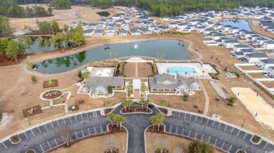 Discover your dream home in the highly desirable Clear Pond on Myrtle Beach National Golf Course in South Carolina - for sale on GolfHomes.com, golf home, golf lot