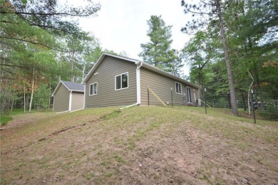 Welcome to your serene Northwoods escape in the heart of Voyager on Voyager Village Country Club - Voyager in Wisconsin - for sale on GolfHomes.com, golf home, golf lot