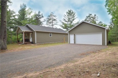 Welcome to your serene Northwoods escape in the heart of Voyager on Voyager Village Country Club - Voyager in Wisconsin - for sale on GolfHomes.com, golf home, golf lot
