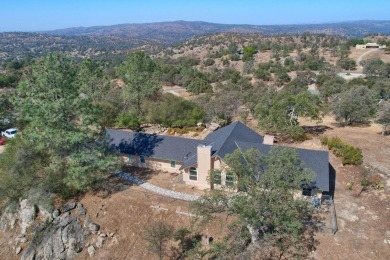 Stunning home that has been loving updated and improved in on Yosemite Lakes Park Golf Course in California - for sale on GolfHomes.com, golf home, golf lot