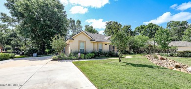 A custom built POOL home on close to 1/2 acre in the wooded area on Magnolia Point Golf and Country Club in Florida - for sale on GolfHomes.com, golf home, golf lot