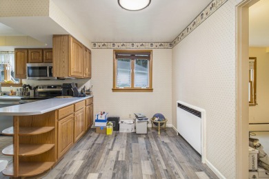 Hamlin Township - This 3-bedroom, 2-bath home sits on 1.5 wooded on Lincoln Hills Golf Club in Michigan - for sale on GolfHomes.com, golf home, golf lot