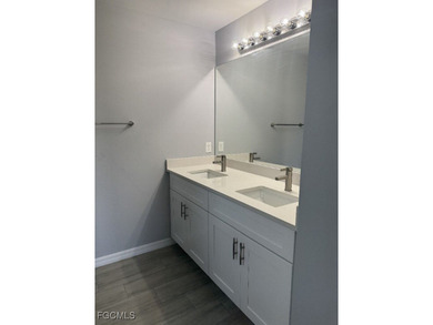 Charming and cozy 4-bedroom, 2 full bath home featuring a on Copperhead Golf Club in Florida - for sale on GolfHomes.com, golf home, golf lot