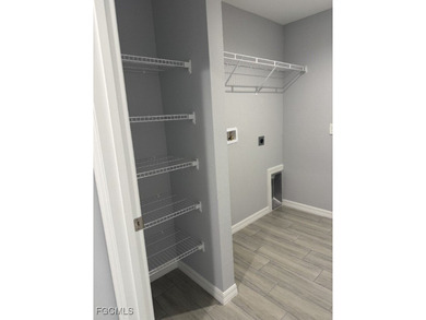 Charming and cozy 4-bedroom, 2 full bath home featuring a on Copperhead Golf Club in Florida - for sale on GolfHomes.com, golf home, golf lot