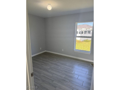 Charming and cozy 4-bedroom, 2 full bath home featuring a on Copperhead Golf Club in Florida - for sale on GolfHomes.com, golf home, golf lot