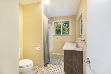 Hamlin Township - This 3-bedroom, 2-bath home sits on 1.5 wooded on Lincoln Hills Golf Club in Michigan - for sale on GolfHomes.com, golf home, golf lot