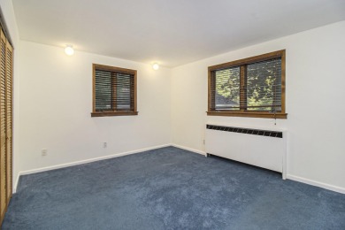 Hamlin Township - This 3-bedroom, 2-bath home sits on 1.5 wooded on Lincoln Hills Golf Club in Michigan - for sale on GolfHomes.com, golf home, golf lot