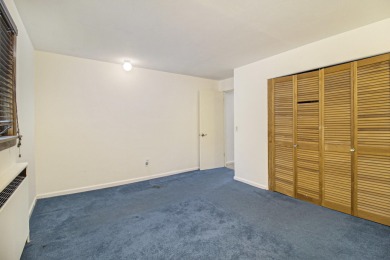 Hamlin Township - This 3-bedroom, 2-bath home sits on 1.5 wooded on Lincoln Hills Golf Club in Michigan - for sale on GolfHomes.com, golf home, golf lot