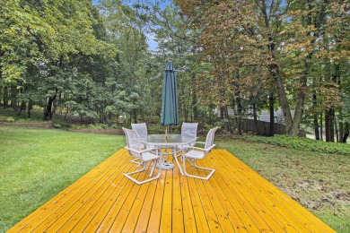 Hamlin Township - This 3-bedroom, 2-bath home sits on 1.5 wooded on Lincoln Hills Golf Club in Michigan - for sale on GolfHomes.com, golf home, golf lot