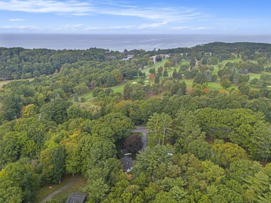 Hamlin Township - This 3-bedroom, 2-bath home sits on 1.5 wooded on Lincoln Hills Golf Club in Michigan - for sale on GolfHomes.com, golf home, golf lot