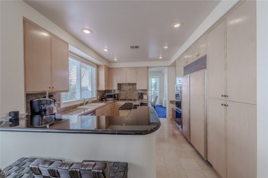 ELEGANT CARMEL 2 MODEL ON ELEVATED GOLF COURSE LOT OVERLOOKING on Spanish Trail Golf and Country Club in Nevada - for sale on GolfHomes.com, golf home, golf lot