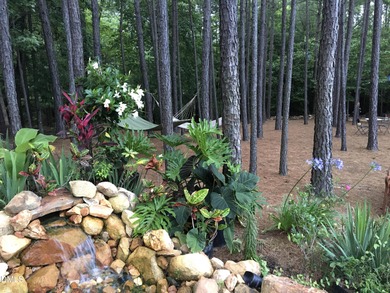 Welcome to an exceptional home in The Legacy at Jordan Lake, one on The Preserve At Jordan Lake Golf Club in North Carolina - for sale on GolfHomes.com, golf home, golf lot