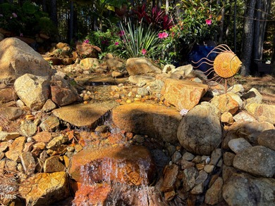 Welcome to an exceptional home in The Legacy at Jordan Lake, one on The Preserve At Jordan Lake Golf Club in North Carolina - for sale on GolfHomes.com, golf home, golf lot