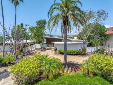 A unique, Mid-Century Modern home located on highly sought-after on Treasure Bay Golf and Tennis in Florida - for sale on GolfHomes.com, golf home, golf lot