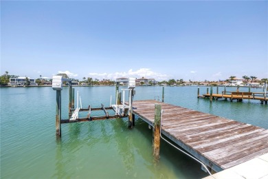 A unique, Mid-Century Modern home located on highly sought-after on Treasure Bay Golf and Tennis in Florida - for sale on GolfHomes.com, golf home, golf lot