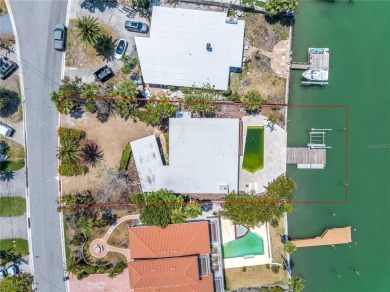 A unique, Mid-Century Modern home located on highly sought-after on Treasure Bay Golf and Tennis in Florida - for sale on GolfHomes.com, golf home, golf lot