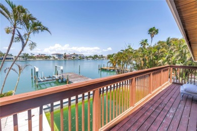 A unique, Mid-Century Modern home located on highly sought-after on Treasure Bay Golf and Tennis in Florida - for sale on GolfHomes.com, golf home, golf lot