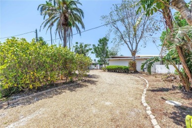 A unique, Mid-Century Modern home located on highly sought-after on Treasure Bay Golf and Tennis in Florida - for sale on GolfHomes.com, golf home, golf lot